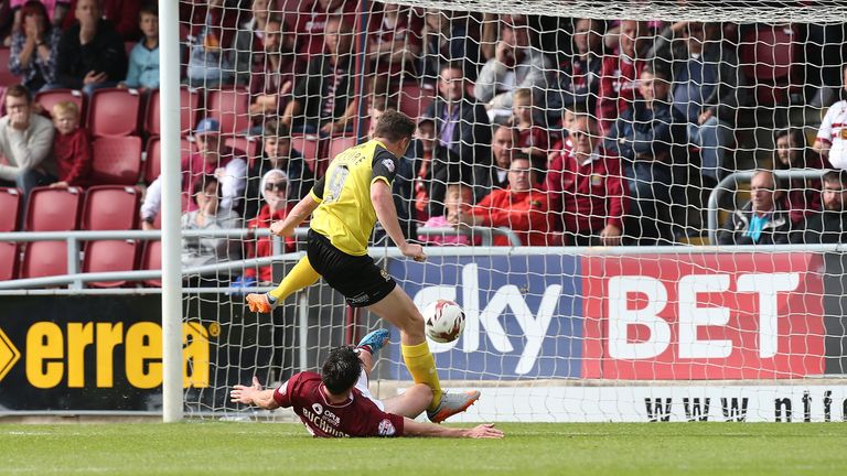 Matt McClure scores his Dagenham and Redbridge's second  goal against Northampton
