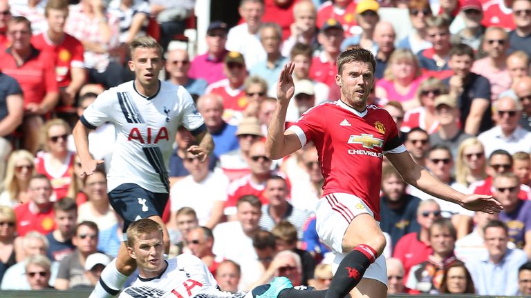 Michael Carrick of Manchester United in action with Eric Dier of Tottenham Hotspur