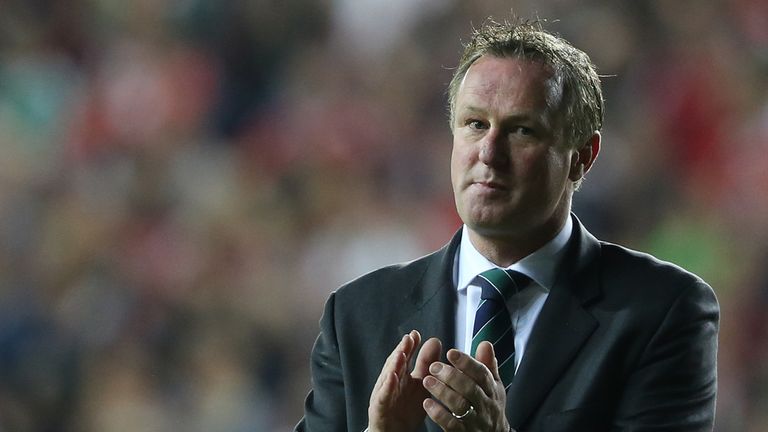 Northern Ireland manager Michael O'Neill applauds the fans after the UEFA European Championship Qualifying match at Windsor Park, Belfast.
