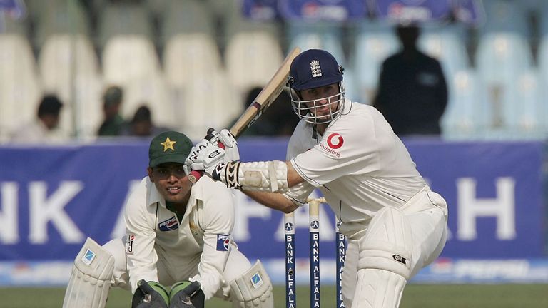 Wicketkeeper Kamran Akmal looks on as Vaughan sweeps in the third Test
