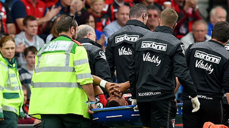 Tyrone Mings was stretchered off just six minutes into his Premier League debut for Bournemouth