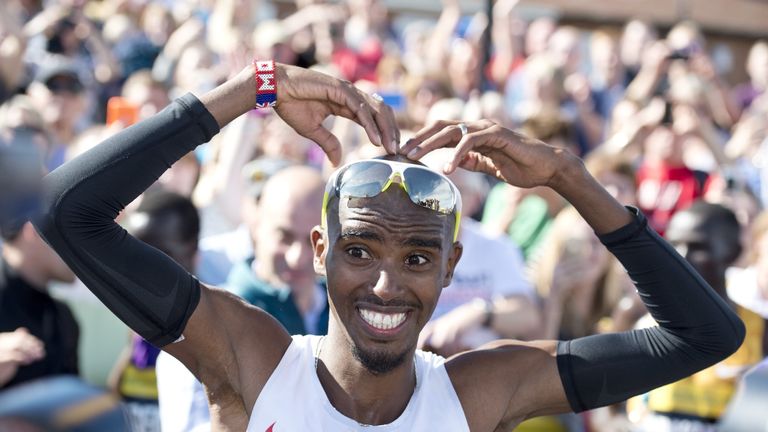 Britain's Mo Farah does his 'mobot' celebration after winning the men's elite race in the Great North Run in South Shields on September 13, 2015. 