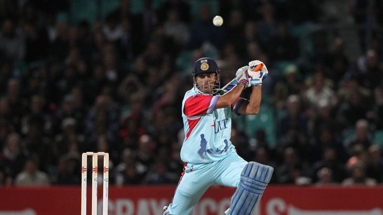 MS Dhoni of the Help for Heroes team hits a boundary during the Cricket for Heroes charity match at The Kia Ovall