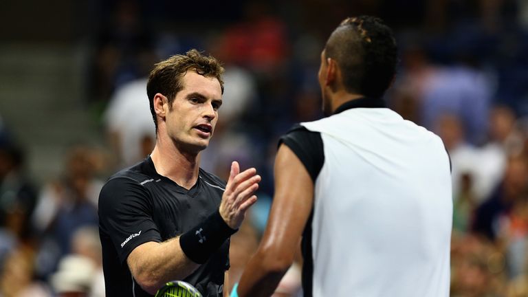NEW YORK, NY - SEPTEMBER 01:  Andy Murray of Great Britain shakes hands at the net after his four set victory during his first round match against Nick Kyr