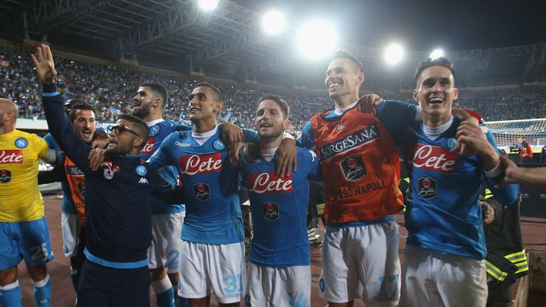 Napoli players celebrate after beating Juventus