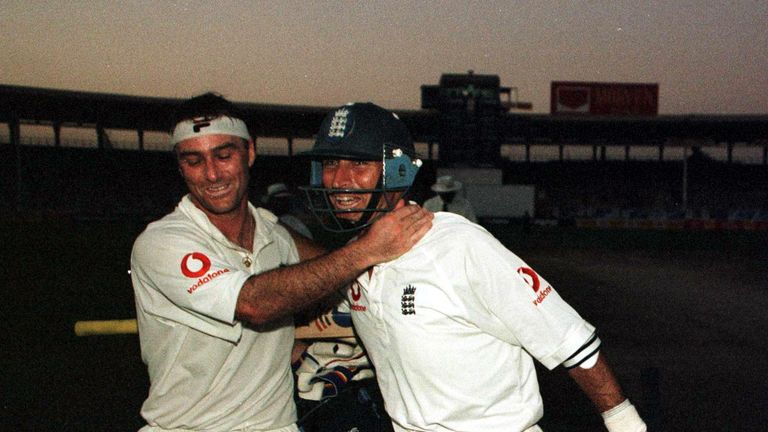 11 Dec 2000:  Nasser Hussain and Graham Thorpe of England celebrate a series win in the dark during the 3rd Pakistan v England Test match at the National S