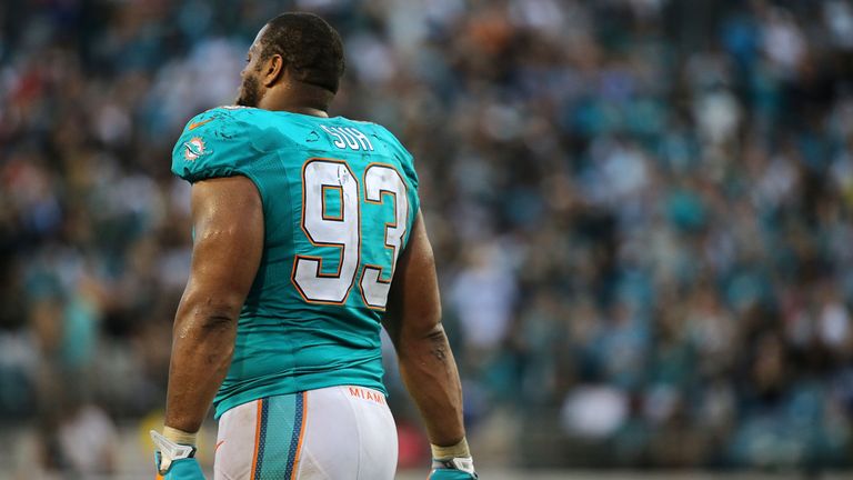 Ndamukong Suh #93 of the Miami Dolphins looks on during a game against the Jacksonville Jaguars at EverBank Field on Sept