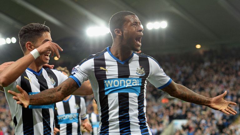 Georginio Wijnaldum celebrates after making it 2-0 in the second half