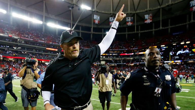 Head coach Dan Quinn of the Atlanta Falcons celebrates beating the Philadelphia Eagles at the Georgia Dome