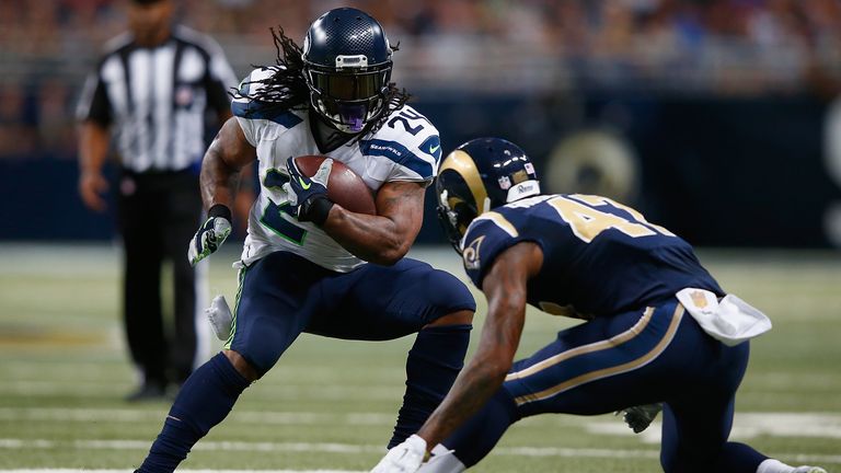 Marshawn Lynch #24 of the Seattle Seahawks rushes against the St. Louis Rams in the second half at the Edward Jones Dome on S