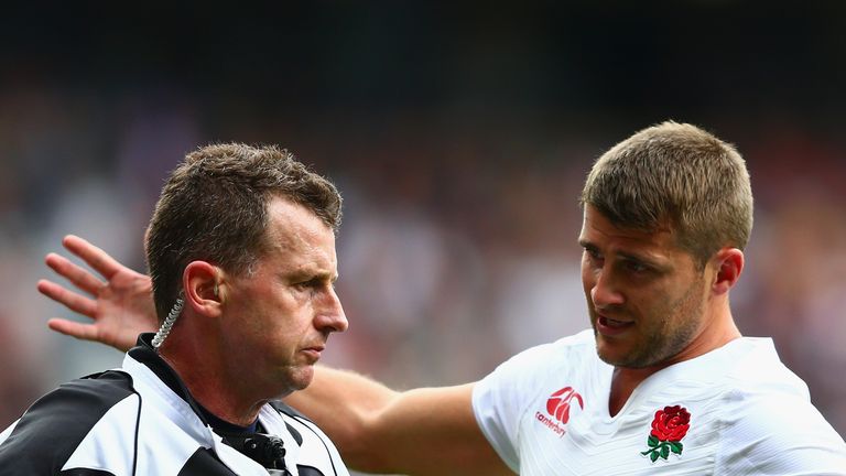 Richard Wigglesworth of England remonstrates with Nigel Owens