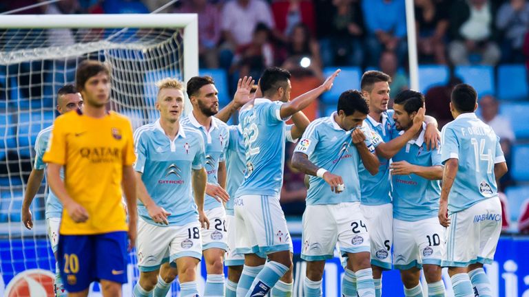 Players of Celta Vigo congratulate their teammate Manuel Agudo 'Nolito'