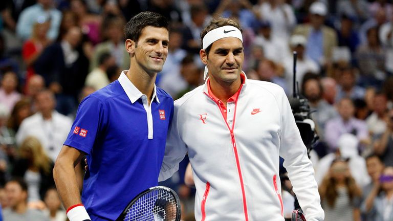 Novak Djokovic, of Serbia, left, and Roger Federer, of Switzerland, pose for photos before the start of the men's  US Open final