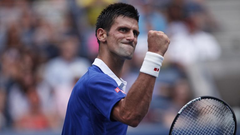 Novak Djokovic celebrates during his match with Andreas Seppi in round three of the US Open