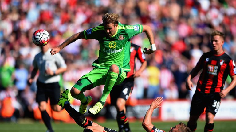 Ola Toivonen of Sunderland is tackled by Simon Francis of Bournemouth