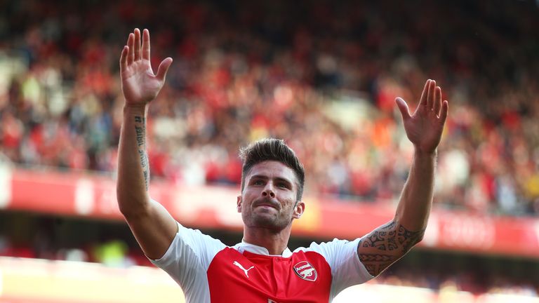 Olivier Giroud of Arsenal celebrates scoring his team's second goal during the Barclays Premier League match against Stoke City