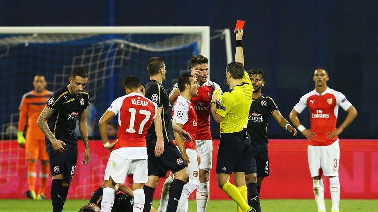 Olivier Giroud of Arsenal is shown the red card