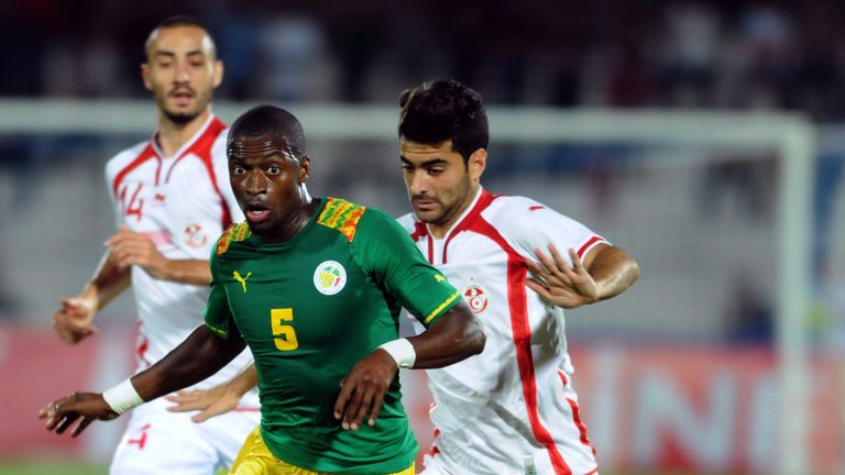 Senegal's Papy Djilobodji (2nd L) vies for the ball with Tunisia's Hamza Mathlouthi (R)  during the 2015 Africa Cup of Nations qualifying 
