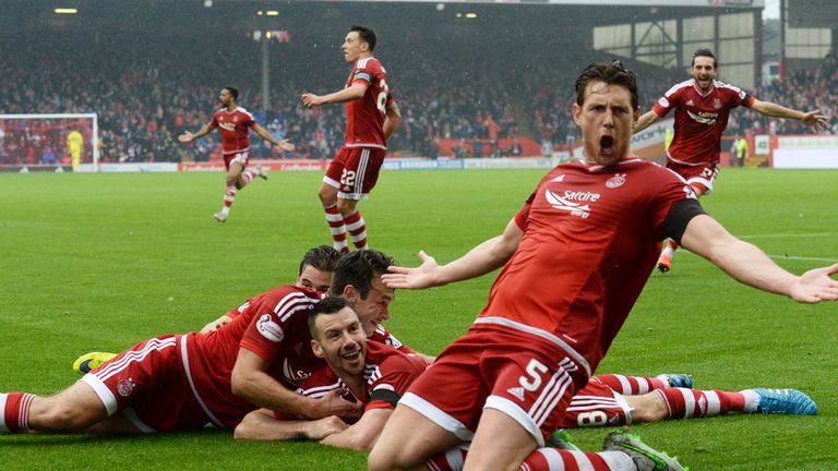 Aberdeen's Paul Quinn celebrates his goal with his team-mates