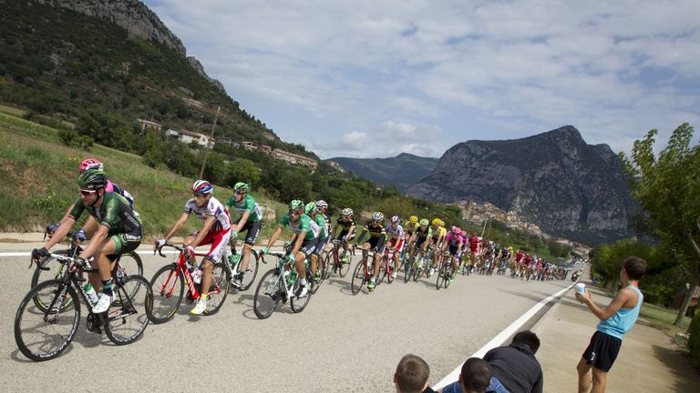The pack rides during the 12th Stage of the 2015 Vuelta Espana cycling tour, a 173km route between Escaldes-Engordany