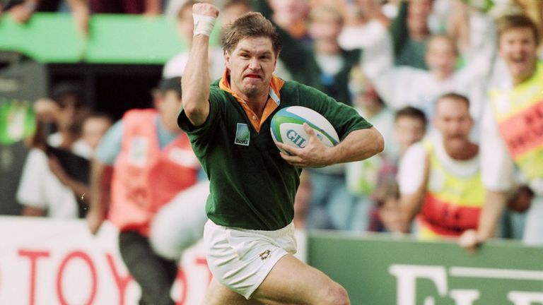 Pieter Hendriks of South Africa raises a clenched fist as he runs into Australia's in goal area in the opening weekend of the 1995 World Cup