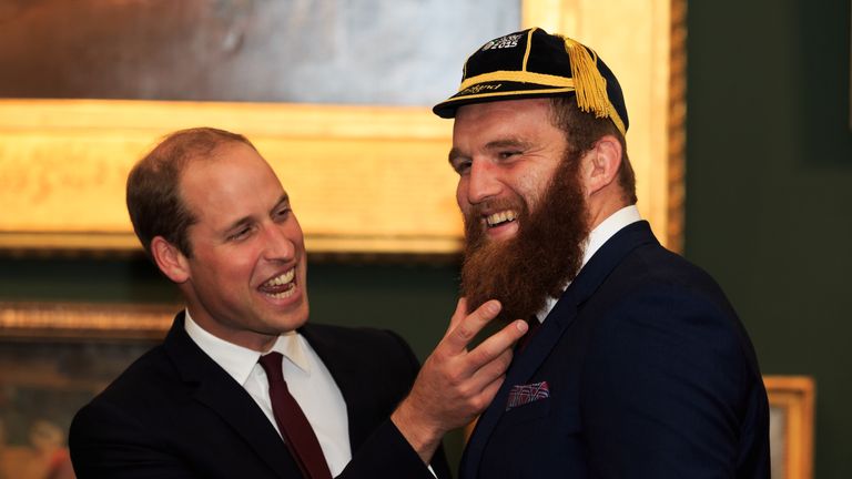 The Duke of Cambridge has a laugh with Wales' Jake Ball during the welcome ceremony at Guildhall, London.