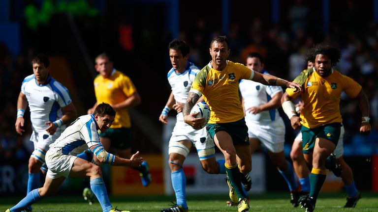  Quade Cooper of Australia makes a break during the 2015 Rugby World Cup Pool A match against Uruguay