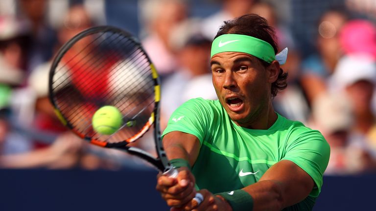 Rafael Nadal of Spain returns a shot against  Diego Schwartzman of Argentina during their Men's Singles Second Round match on