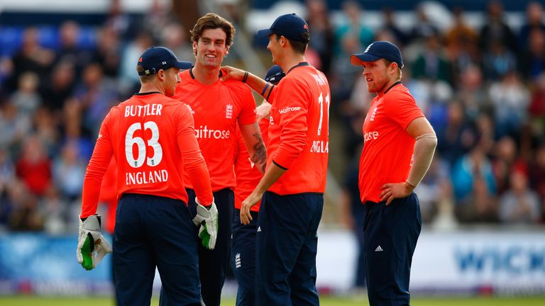 Reece Topley is congratulated by his England team mates after bowling Mitchell Marsh on Monday