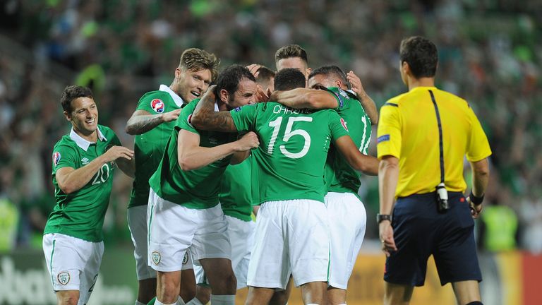 Cyrus Christie of Republic of Ireland celebrates with teammates