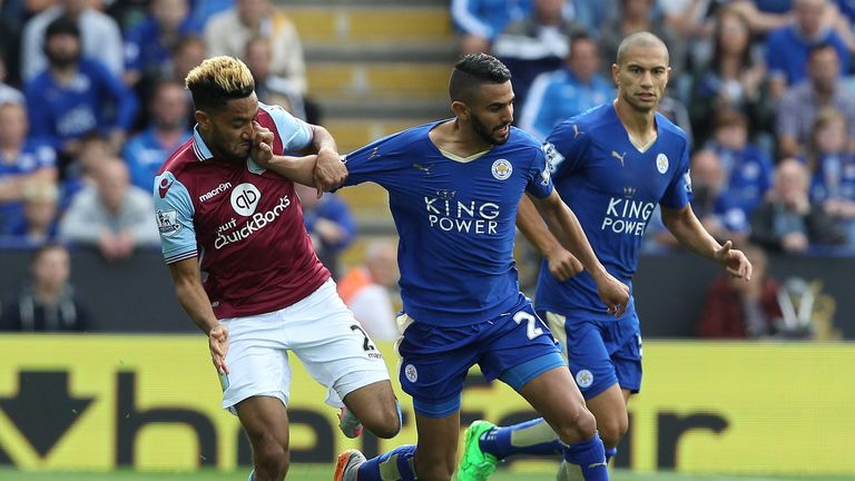 Aston Villa's French defender Jordan Amavi (L) vies with Leicester City's Algerian midfielder Riyad Mahrez
