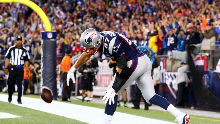 Rob Gronkowski #87 of the New England Patriots spikes the ball to celebrate his touchdown in the second quarter against the Pi