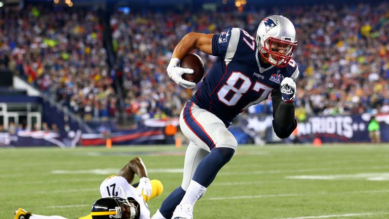 Rob Gronkowski of the New England Patriots breaks a tackle