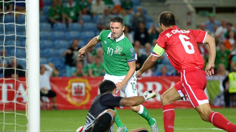 Republic of Ireland's Robbie Keane scores his sides second goal of the match during the UEFA European Championship Qualifying match at the Estadio Algarve,