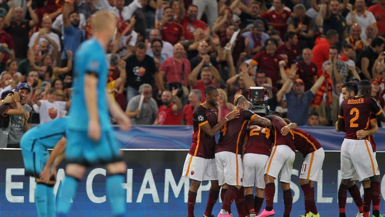 Alessandro Florenzi #24 with his teammates of AS Roma celebrates after scoring against FC Barcelona 