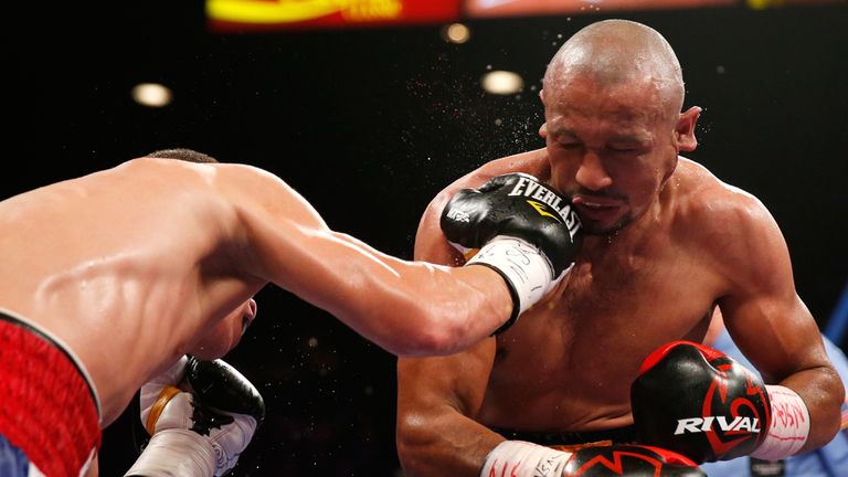 Roman Martinez lands a right on Orlando Salido during their WBO junior lightweight title fight at MGM Grand Garden Arena in Las Vegas