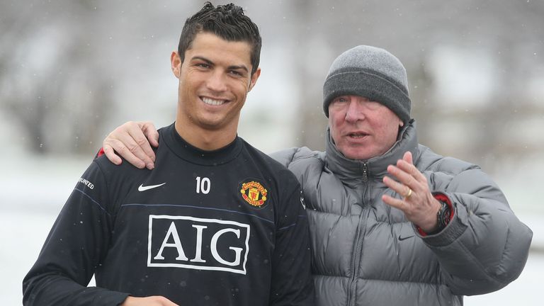 MANCHESTER, ENGLAND - FEBRUARY 6:  Cristiano Ronaldo and Sir Alex Ferguson of Manchester United in action during a first team training session at Carringto