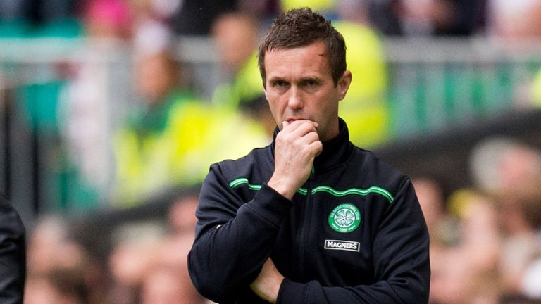 26/09/15 LADBROKES PREMIERSHIP.CELTIC V HEARTS.CELTIC PARK - GLASGOW.Celtic's Ronny Deila stands dejected in the dugout.