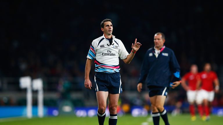 Referee Craig Joubert refers a decision to the TMO during France's win over Italy on Saturday night