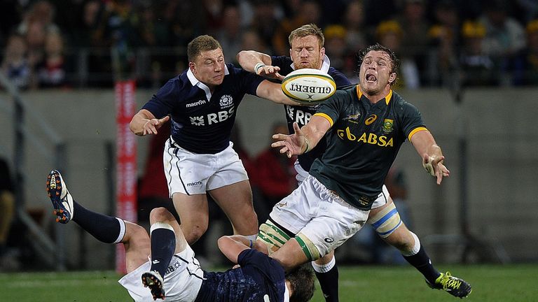 South Africa No 8 Duane Vermeulen offloads the ball during their win over Scotland in June 2014