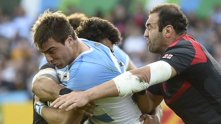 Argentina's Facundo Isa (middle) is tackled by Georgia captain Mamuka Gorgodze