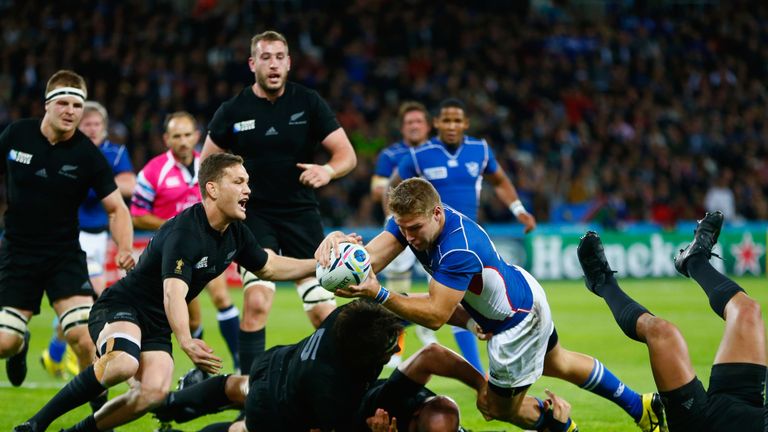 Centre Johan Deysel scores Namibia's try against New Zealand