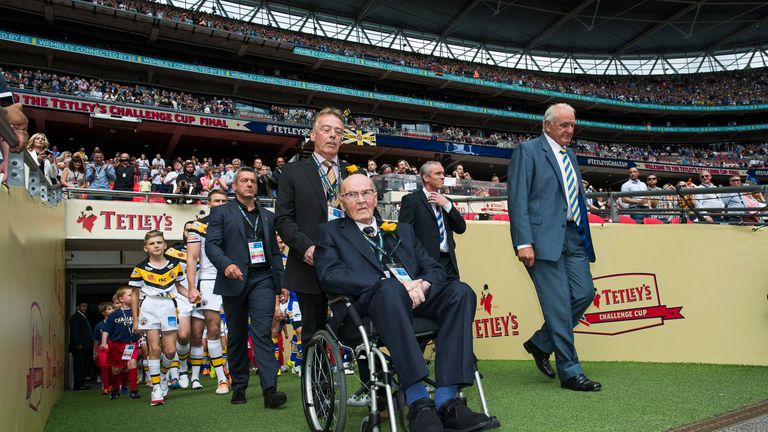 Castleford chairman Jack Fulton and Leeds chairman Paul Caddick lead the teams out for the 2014 Challenge Cup final
