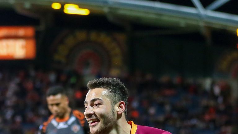 Huddersfield's Jake Connor celebrates his try against Castleford