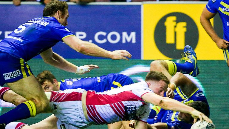 Wigan's Joe Burgess scores the winning try against Warrington in the 2014 play-offs