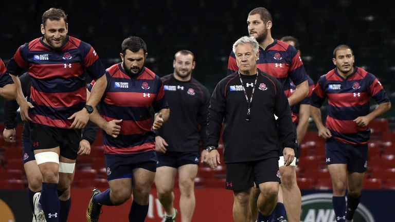 Georgia's head coach Milton Haig puts his side through their paces during the captain's run at the Millennium Stadium