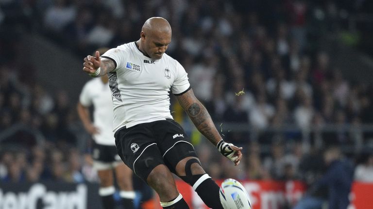Fiji's winger Nemani Nadolo kicks a penalty against England