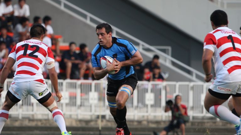 Uruguay captain Santiago Vilaseca runs with the ball against Japan