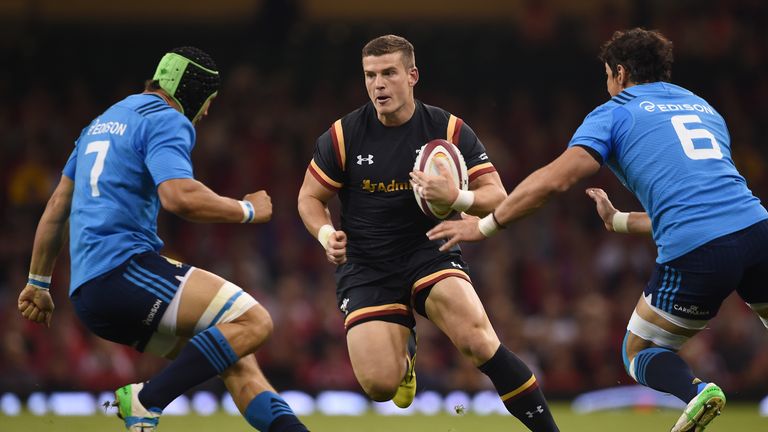 Wales centre Scott Williams breaks past Italy forwards Francesco Minto (left) and Alessandro Zanni