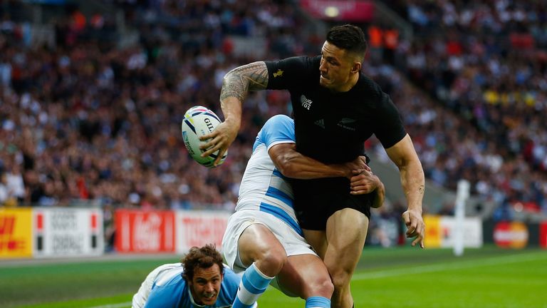 Sonny Bill Williams of New Zealand offloads in the tackle